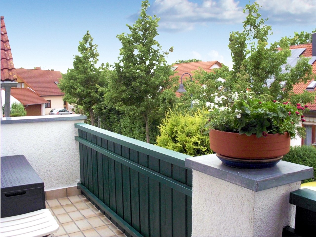 Balkon mit berdachter Sitzecke